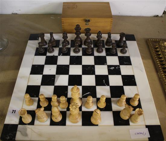 Chess set on board